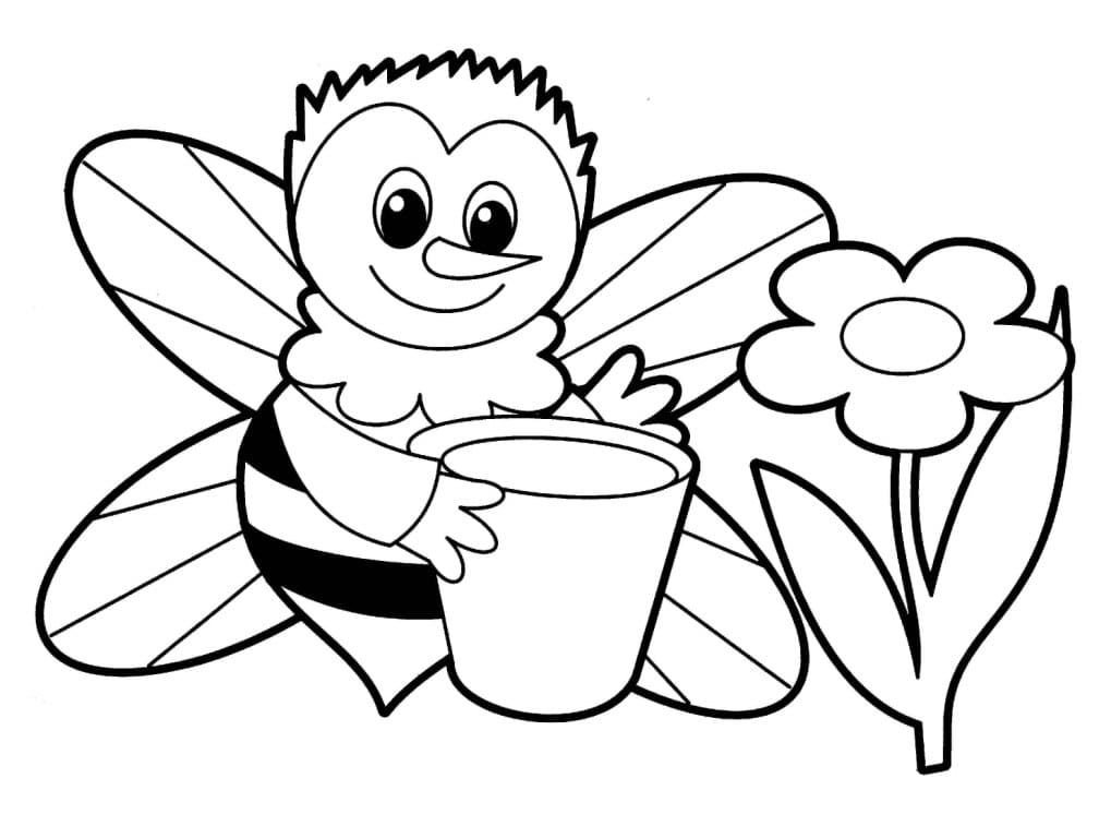 Una abeja recolecta el néctar de las flores.