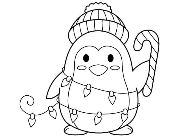 Pingüino con bastón de caramelo