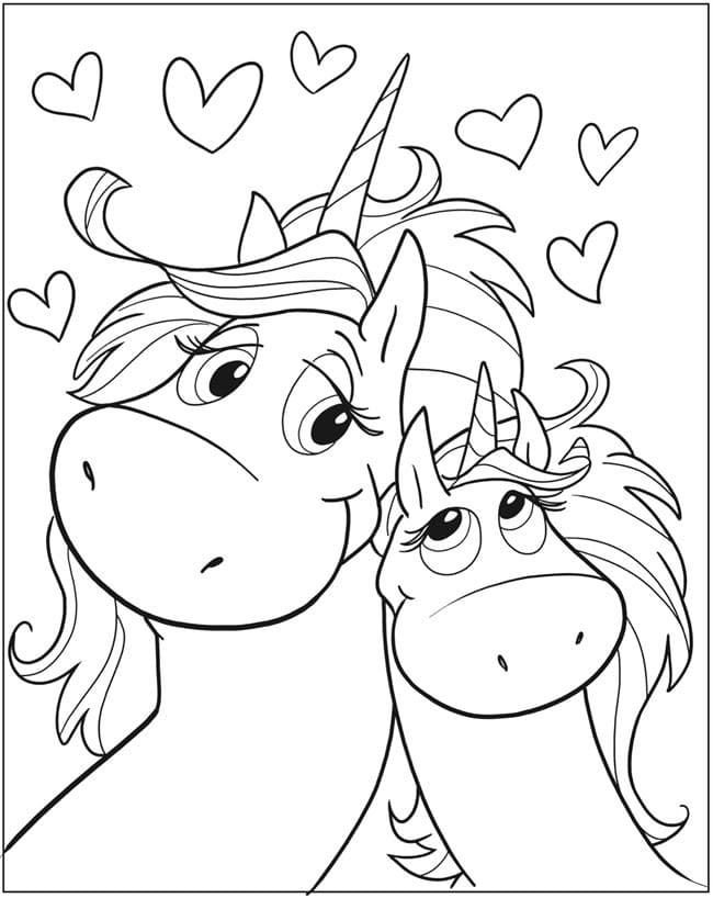 Dos adorables unicornios y corazones.