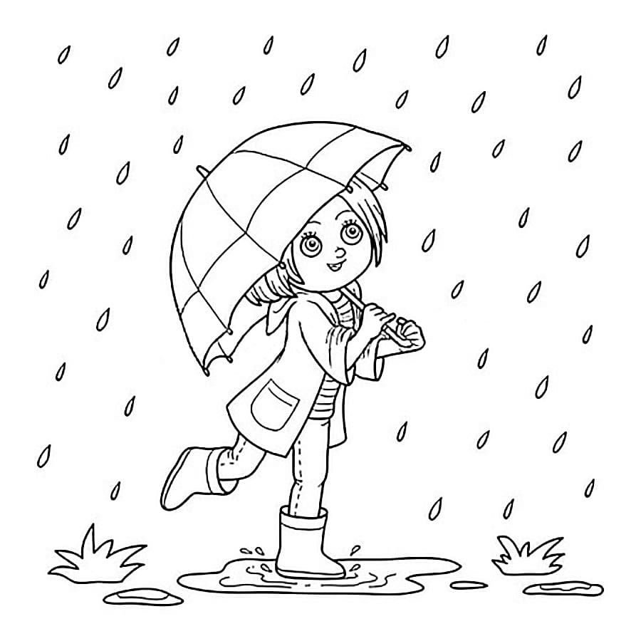 La niña se esconde de la lluvia bajo un paraguas.