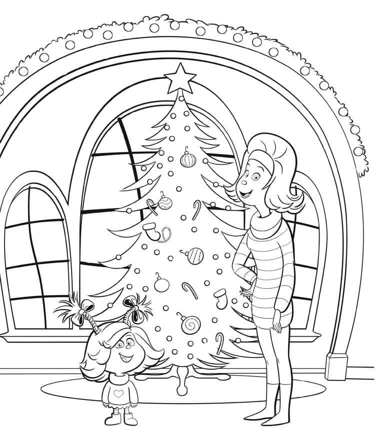 Cindy Lou y su mamá decoran el árbol de Navidad