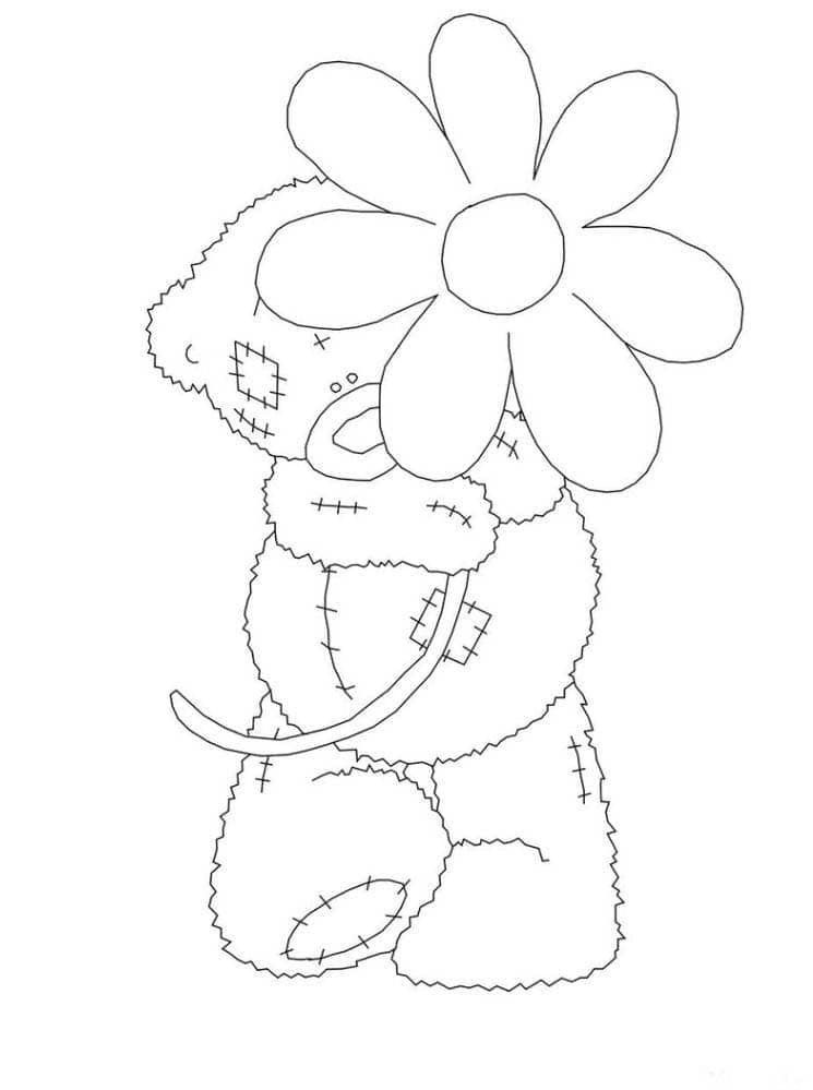 Oso de peluche con una flor